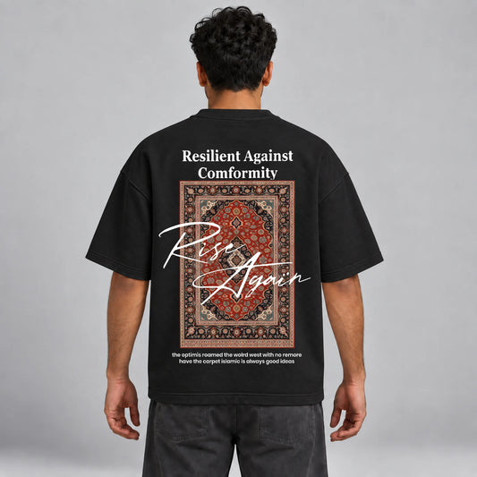 Model wearing KIFL Rise Again oversized black tee – straight back view