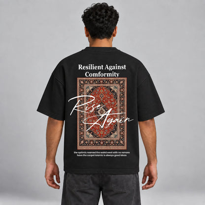 Model wearing KIFL Rise Again oversized black tee – straight back view