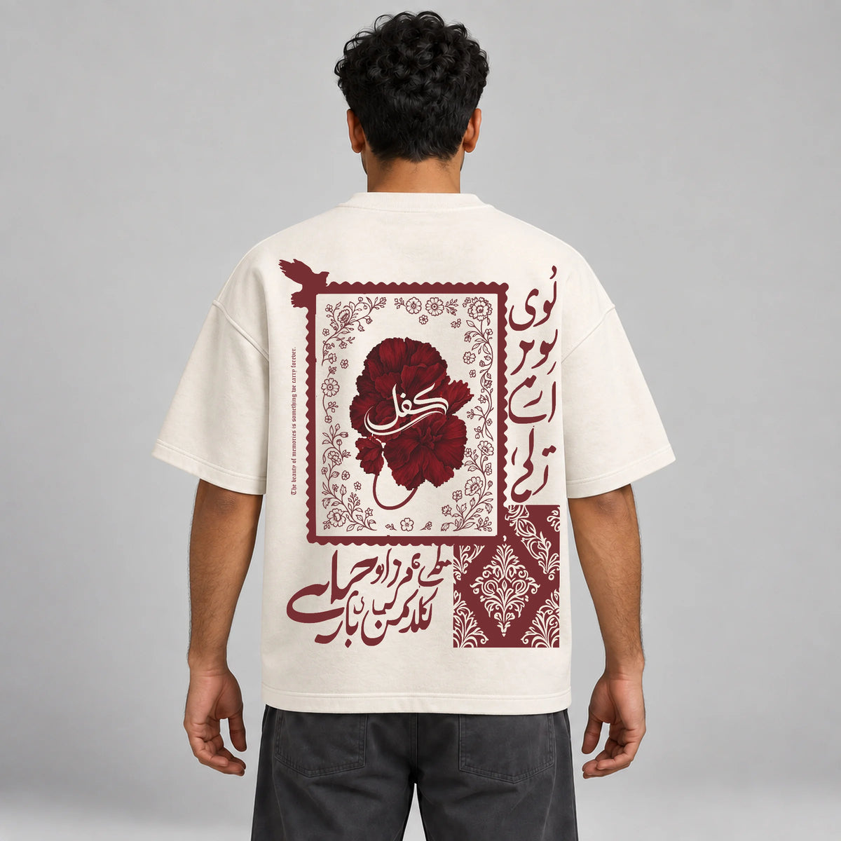 Model wearing KIFL Urdu Floral oversized tee – straight back view