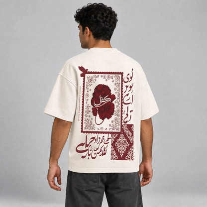 Model wearing KIFL Urdu Floral oversized tee – three-quarter back view